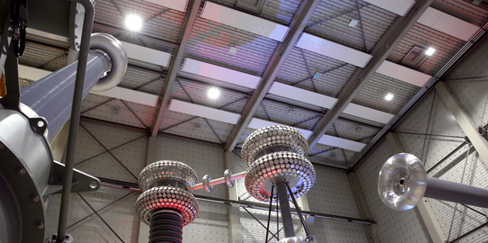 Interior view of the HVDC test centre with HV source and voltage divider